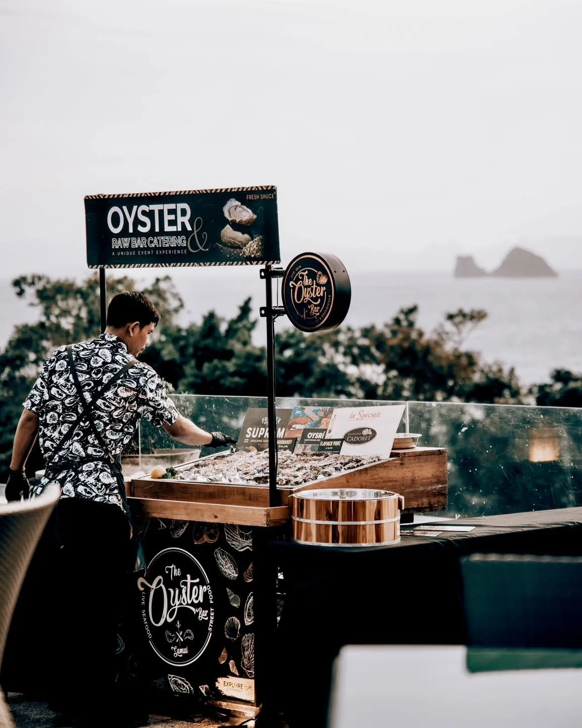 A live oyster shucking station set up for an event